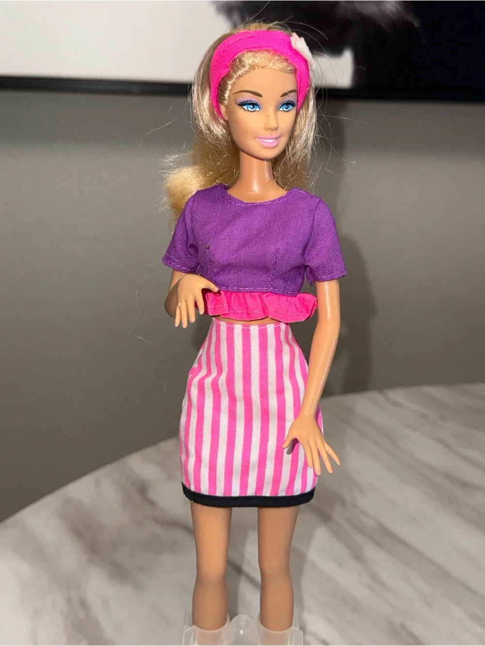 Barbie Mattel 1998 blonde doll wearing 1990’s colorful two piece outfit